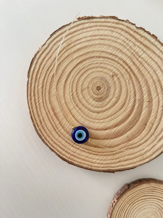 Minimalist yarn with Turkish eye |